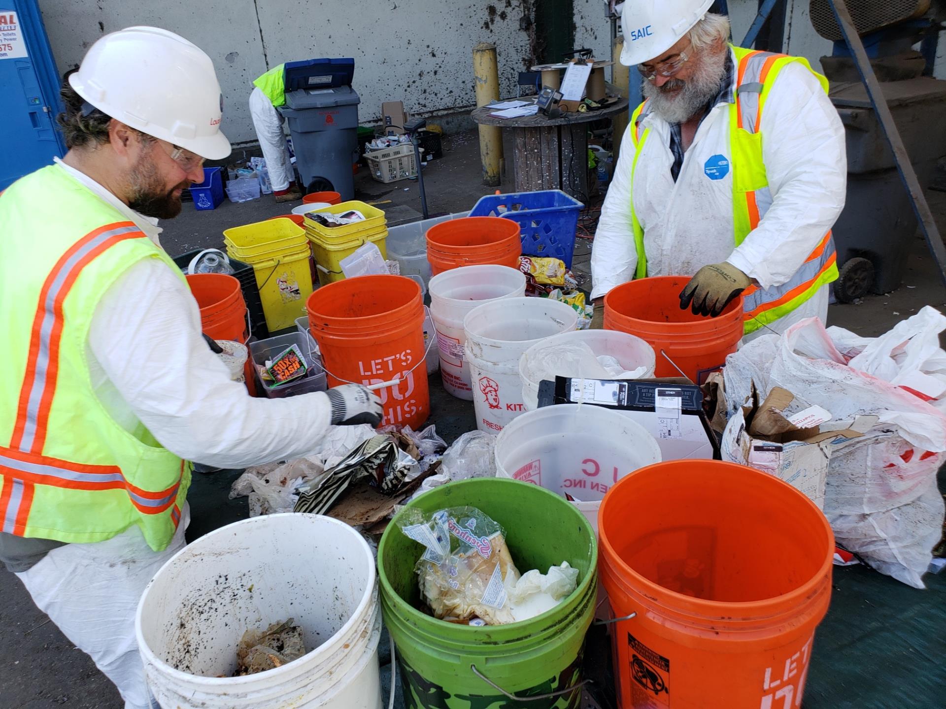 People sorting items at a Zero Waste Workshop