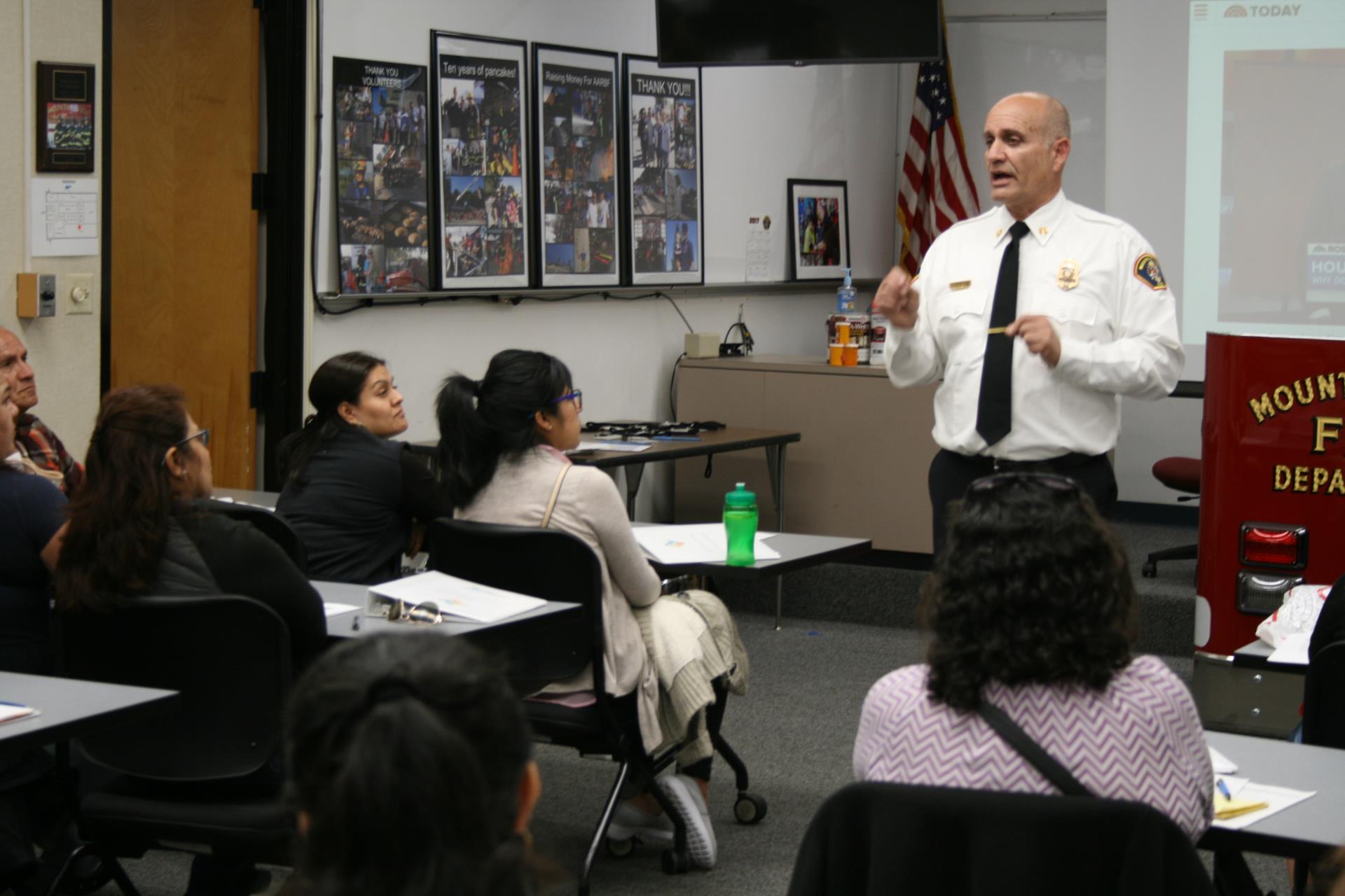 Fire Chief speaking in front of classroom